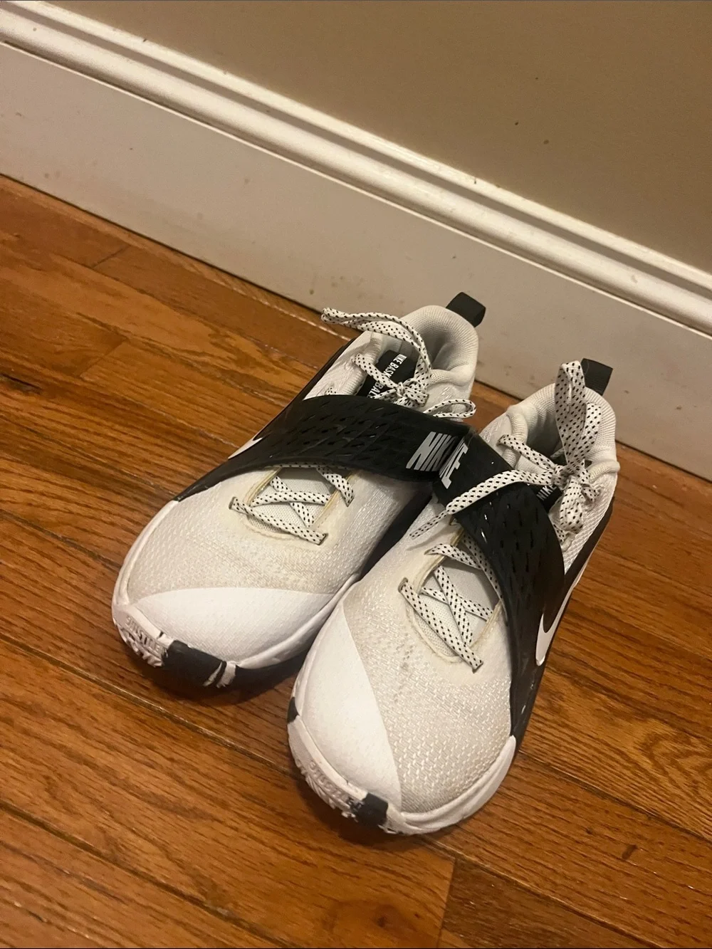 Kids White and Black Athletic Sneakers with Swoosh Detail
